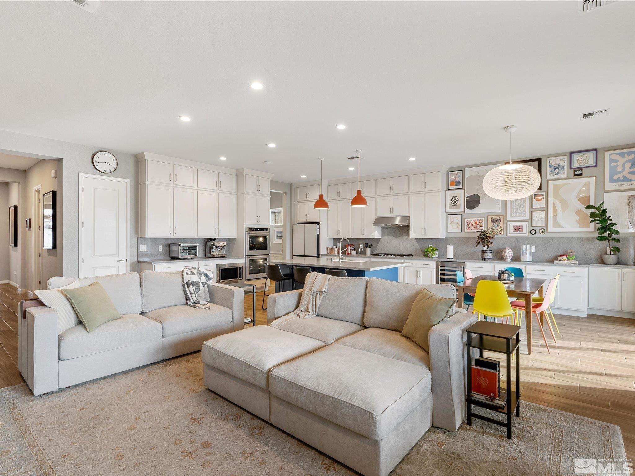 15033 Iron River Drive Reno, NV 89521 - Photo 16 of 39 a living room with furniture and kitchen view
