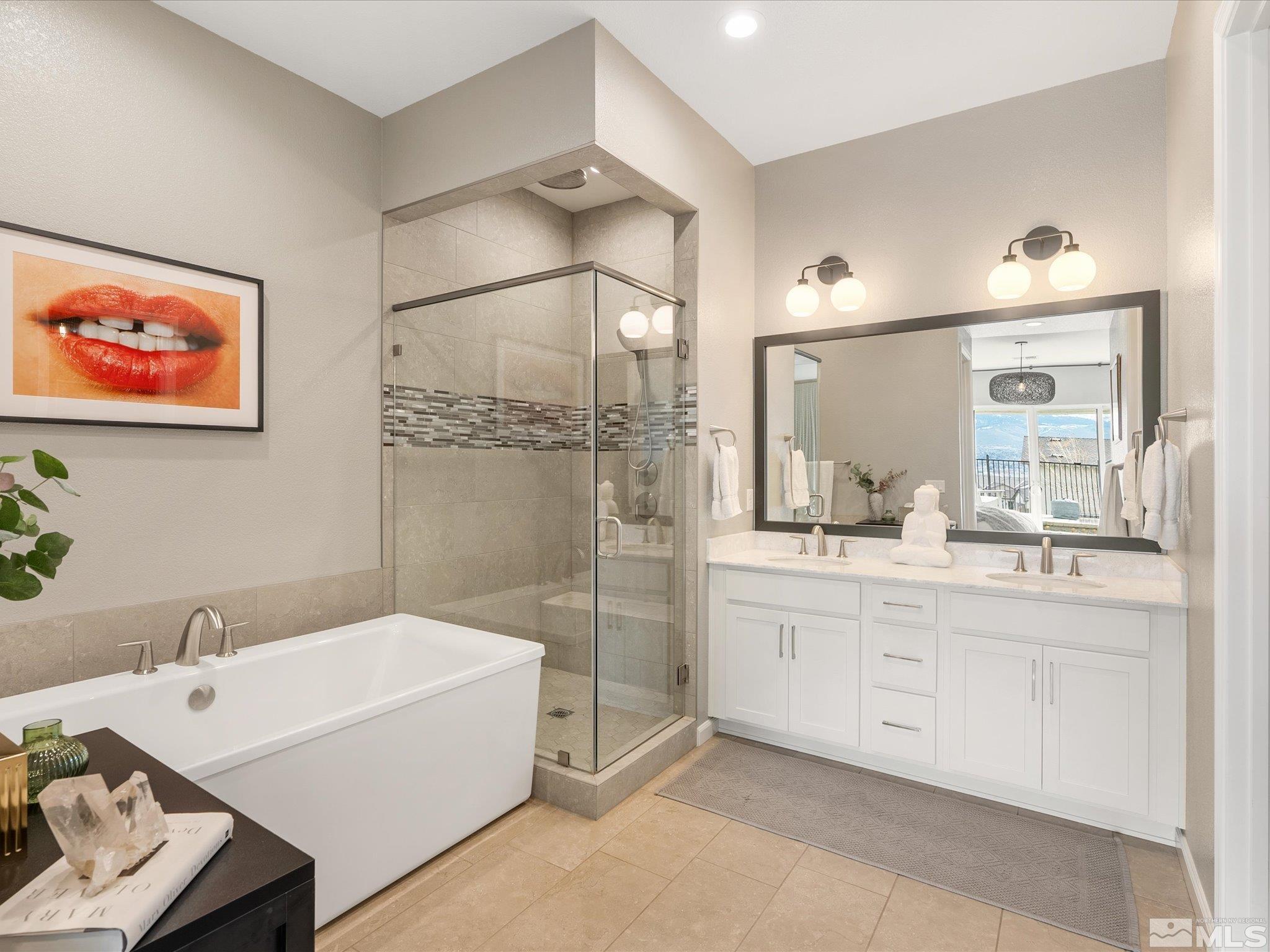15033 Iron River Drive Reno, NV 89521 - Photo 26 of 39 a spacious bathroom with a tub sink and mirror