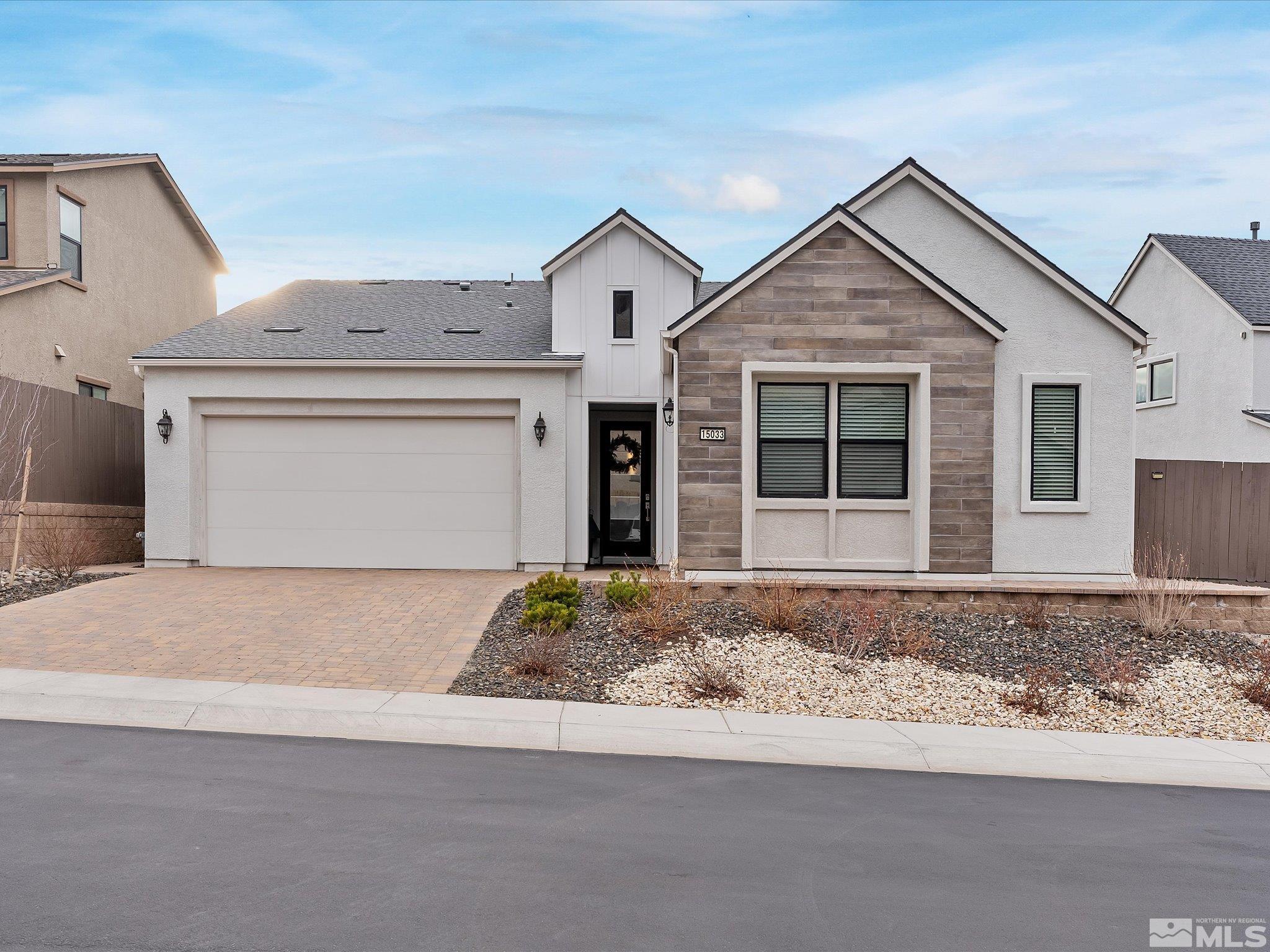 15033 Iron River Drive Reno, NV 89521 - Photo 4 of 39 a front view of a house