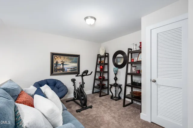 a view of a livingroom with furniture and windows
