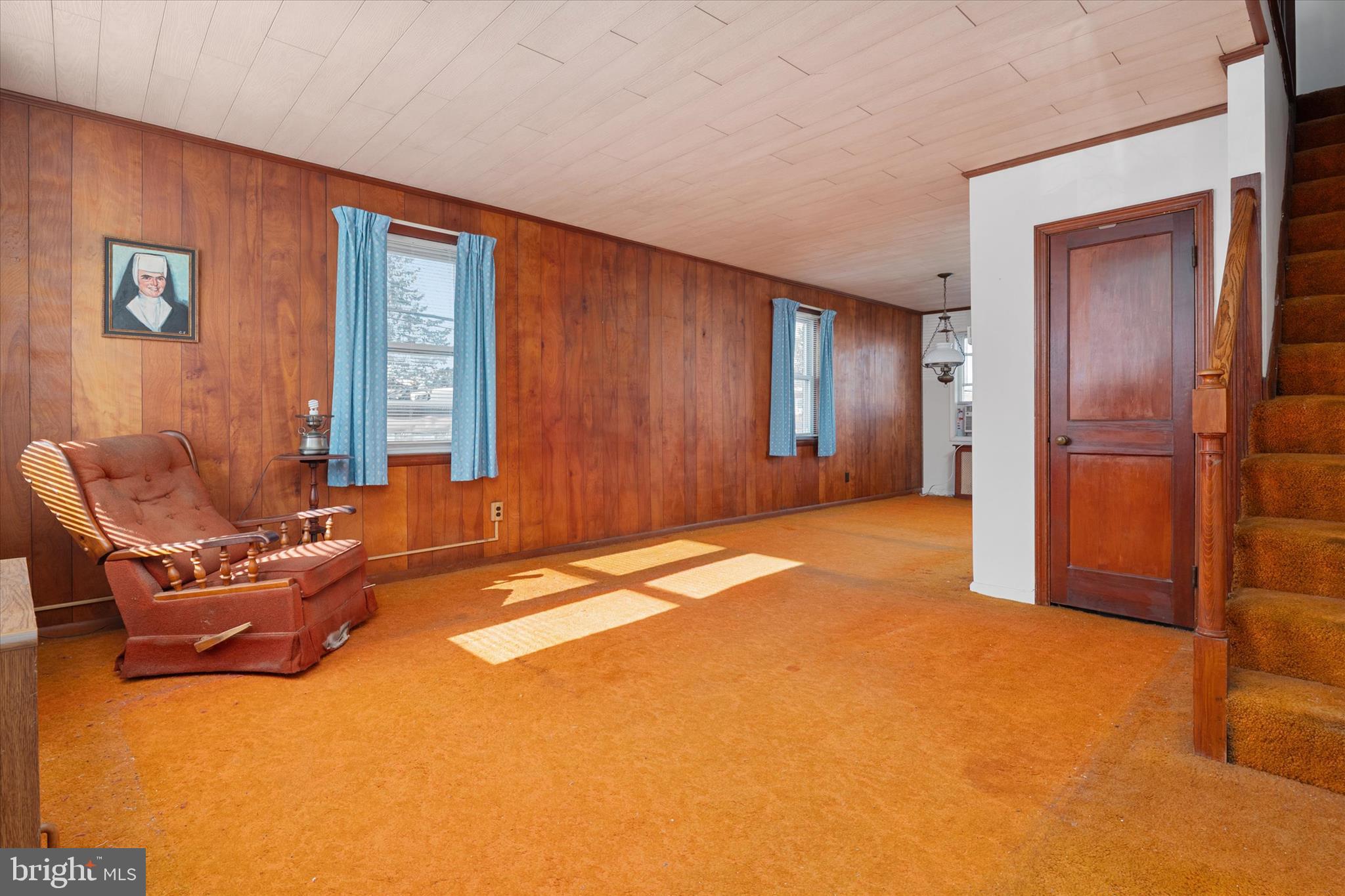 336 Arden Road West Baltimore, MD 21225 - Photo 3 of 21 a furnished livingroom with a window and a couch