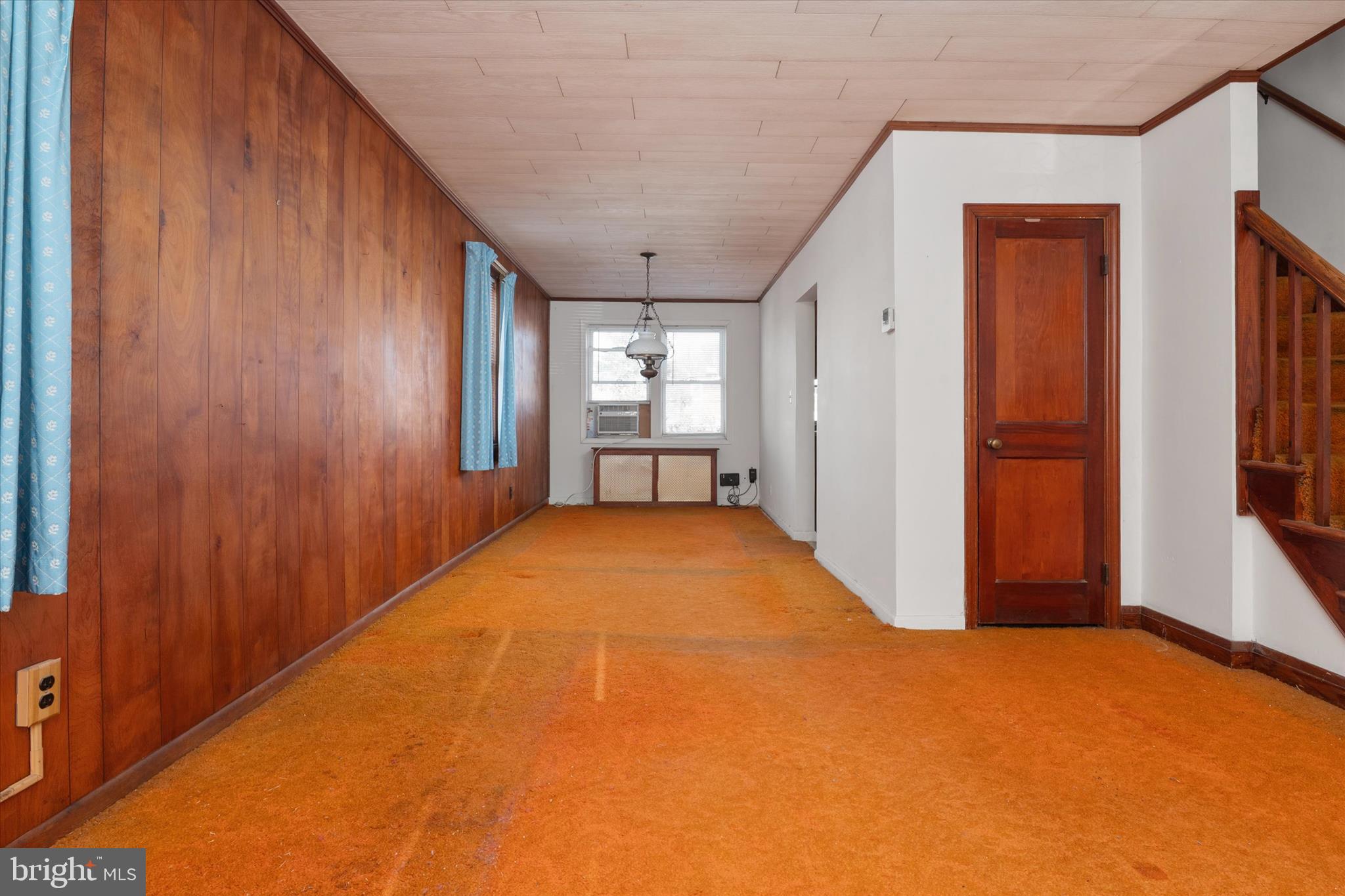 336 Arden Road West Baltimore, MD 21225 - Photo 5 of 21 a view of empty room with windows and air conditioner