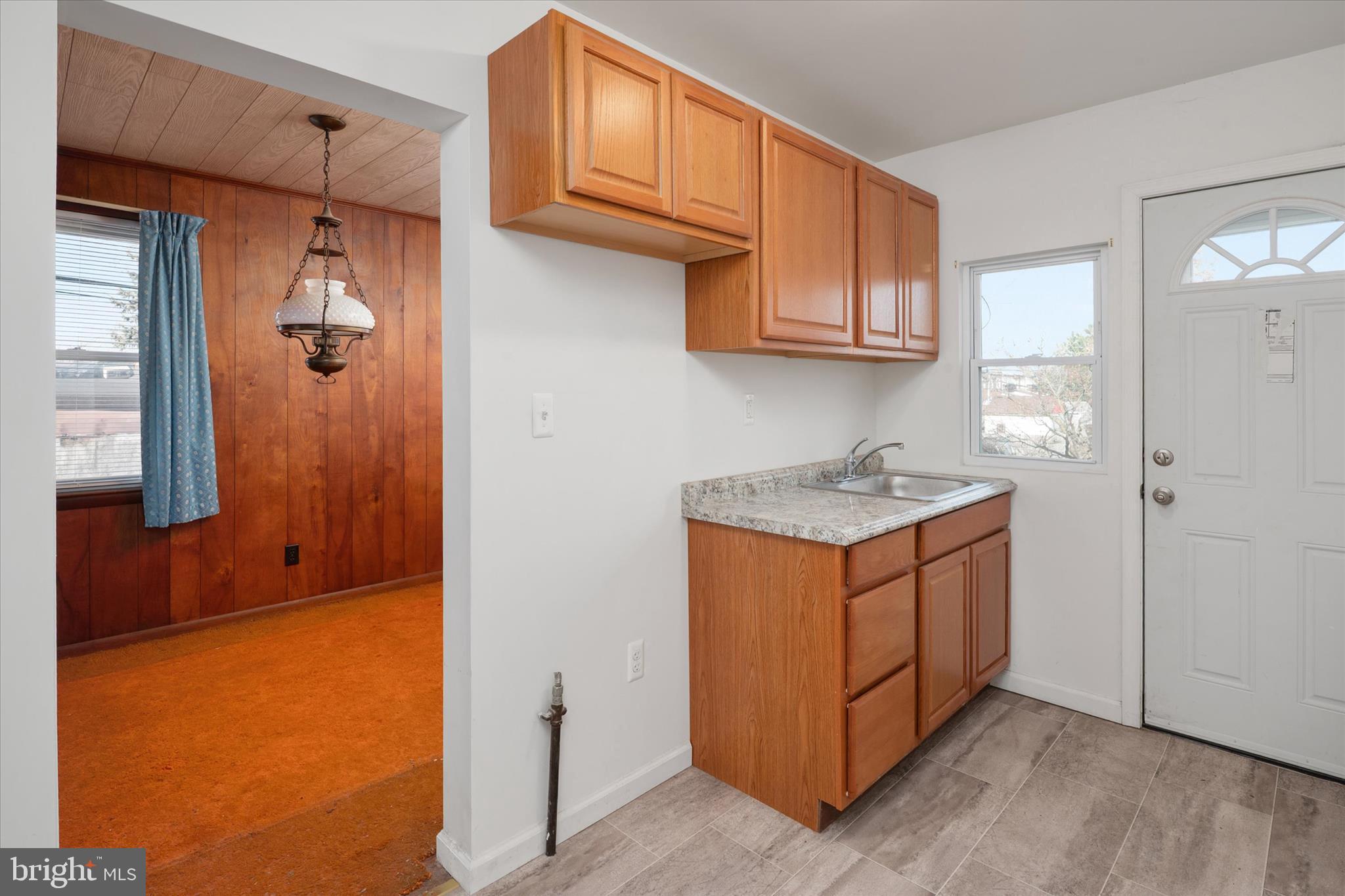 336 Arden Road West Baltimore, MD 21225 - Photo 8 of 21 a room with storage and utility