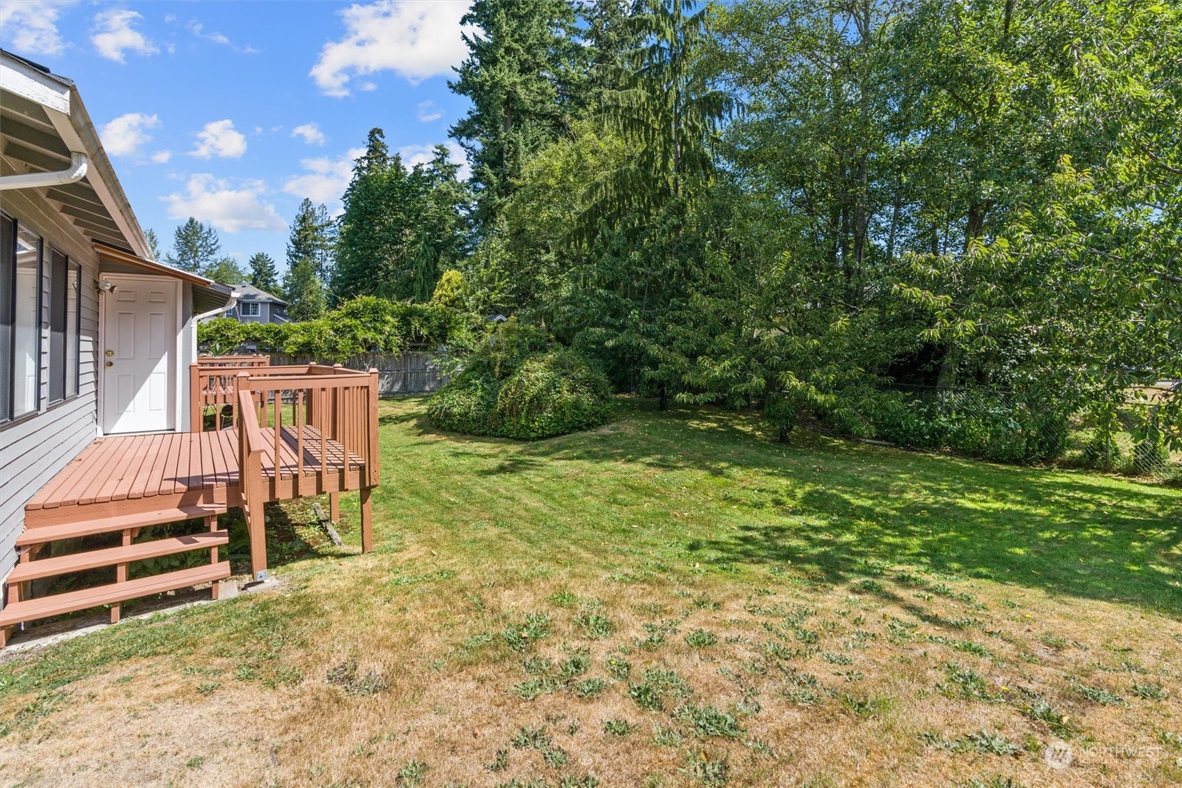 14919 54th Place West Edmonds, WA 98026 - Photo 28 of 33 a view of backyard with deck and garden