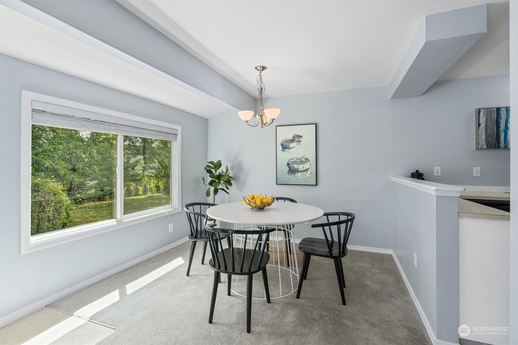 14919 54th Place West Edmonds, WA 98026 - Photo 9 of 33 a view of a dining room with furniture window and wooden floor