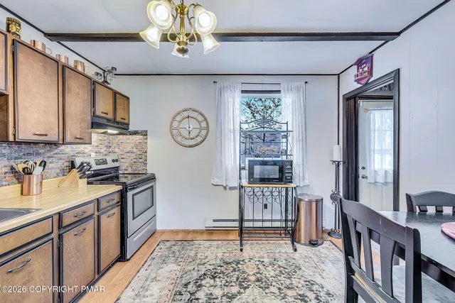 a view of a dining room with furniture