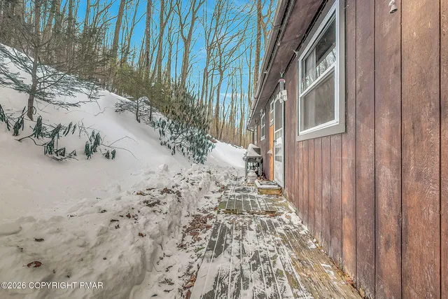 a view of a road with a trees in the background