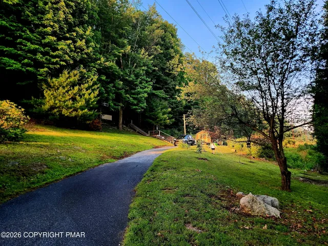 a view of a golf course with a garden