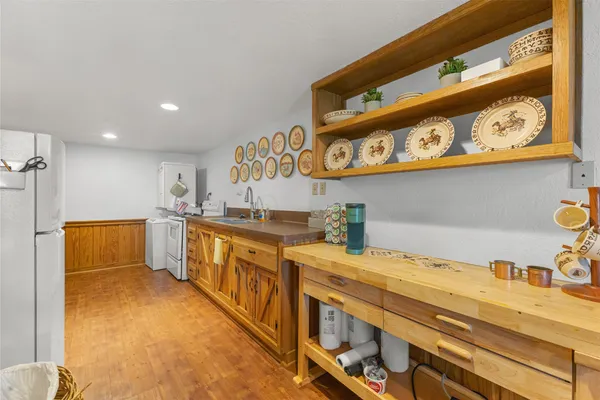 a kitchen with stainless steel appliances cabinets and a kitchen