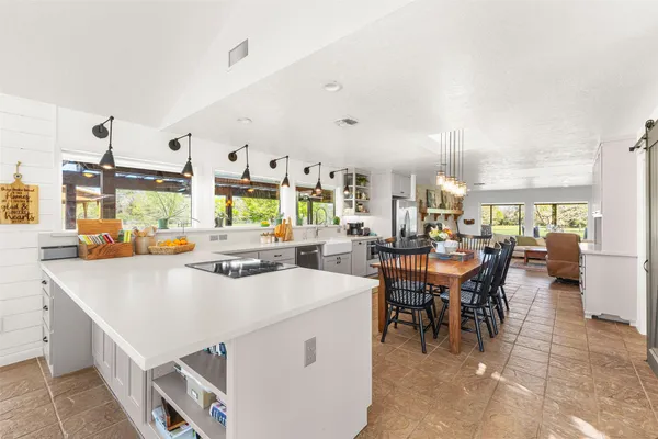 a view of kitchen with cabinets and stainless steel appliances