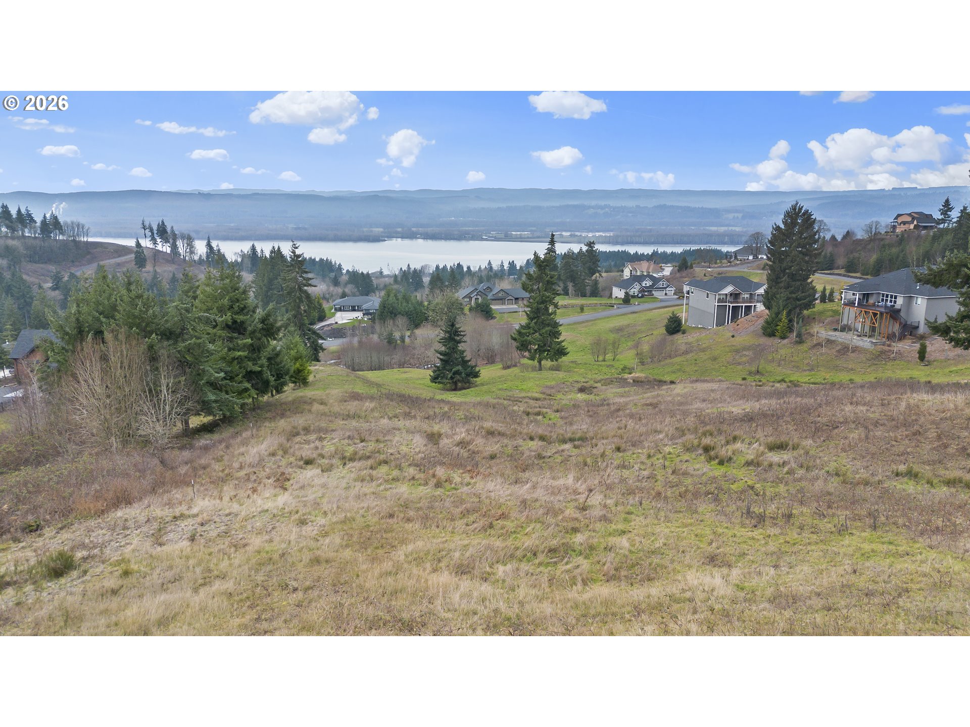 202 Windy River Road, Unit 78 Kalama, WA 98625 - Photo 2 of 12 a black and white photo of a field