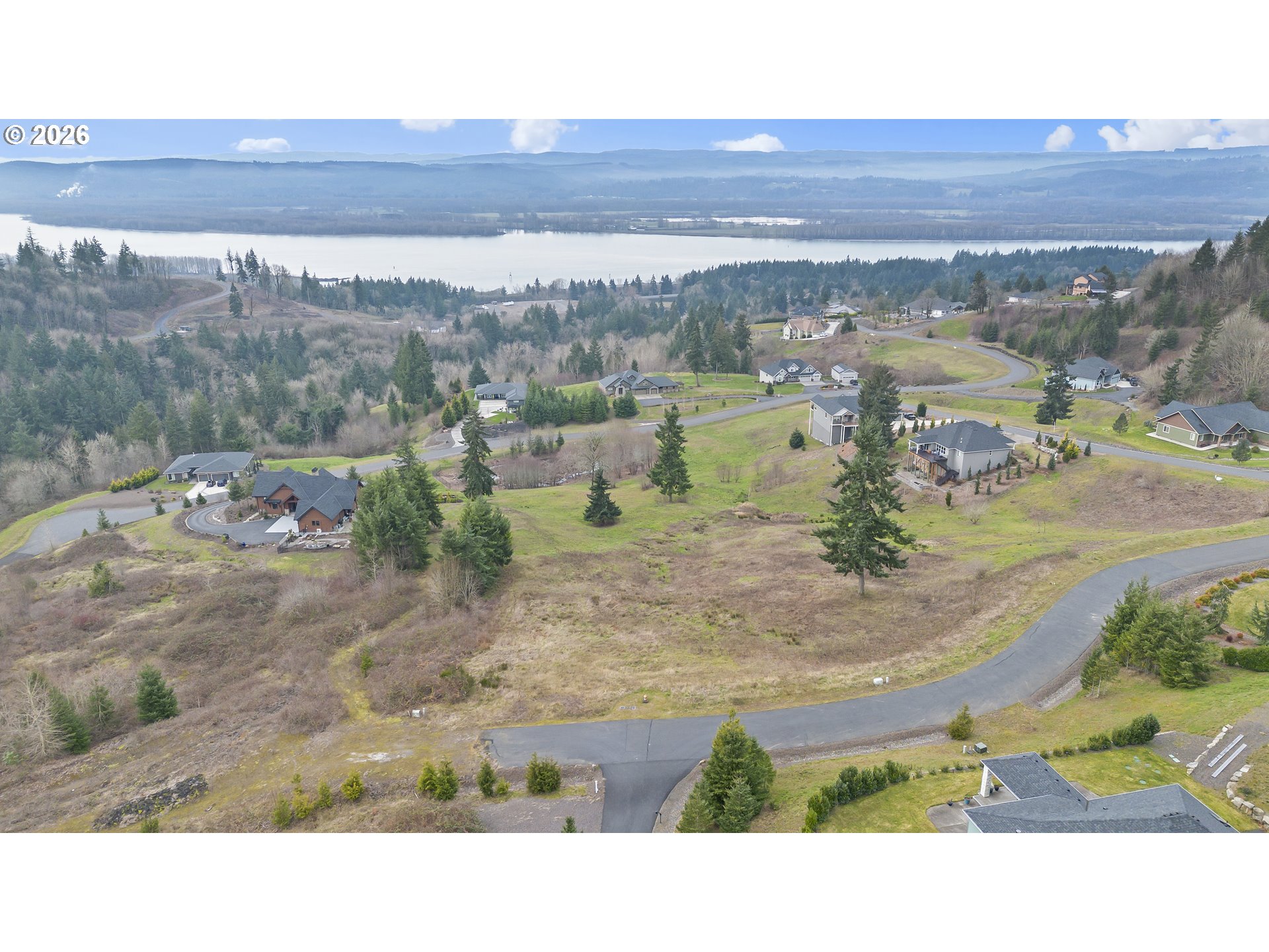 202 Windy River Road, Unit 78 Kalama, WA 98625 - Photo 7 of 12 a black and white photo of a big yard
