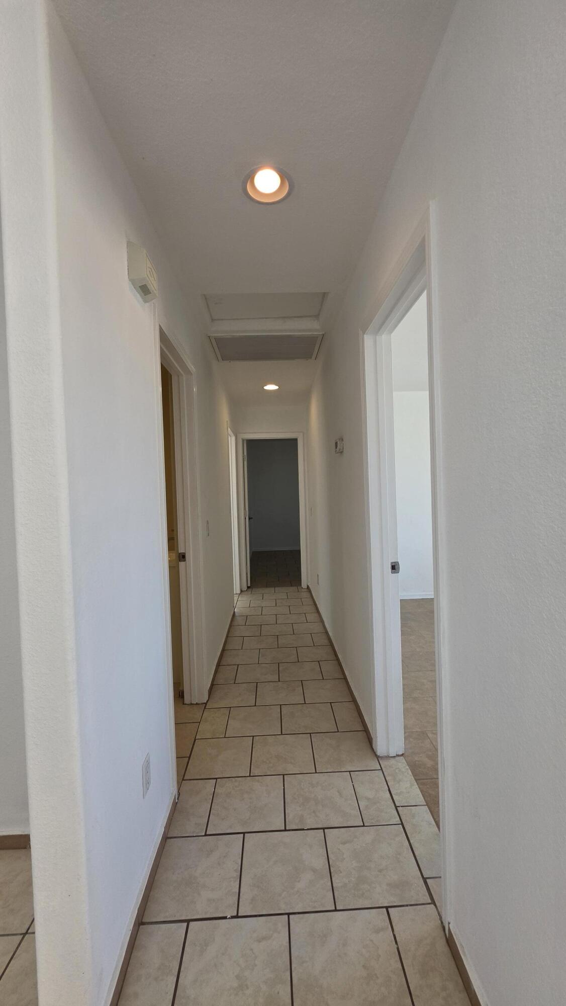2778 Calhoun Street Thermal, CA 92274 - Photo 15 of 23 a view of a hallway