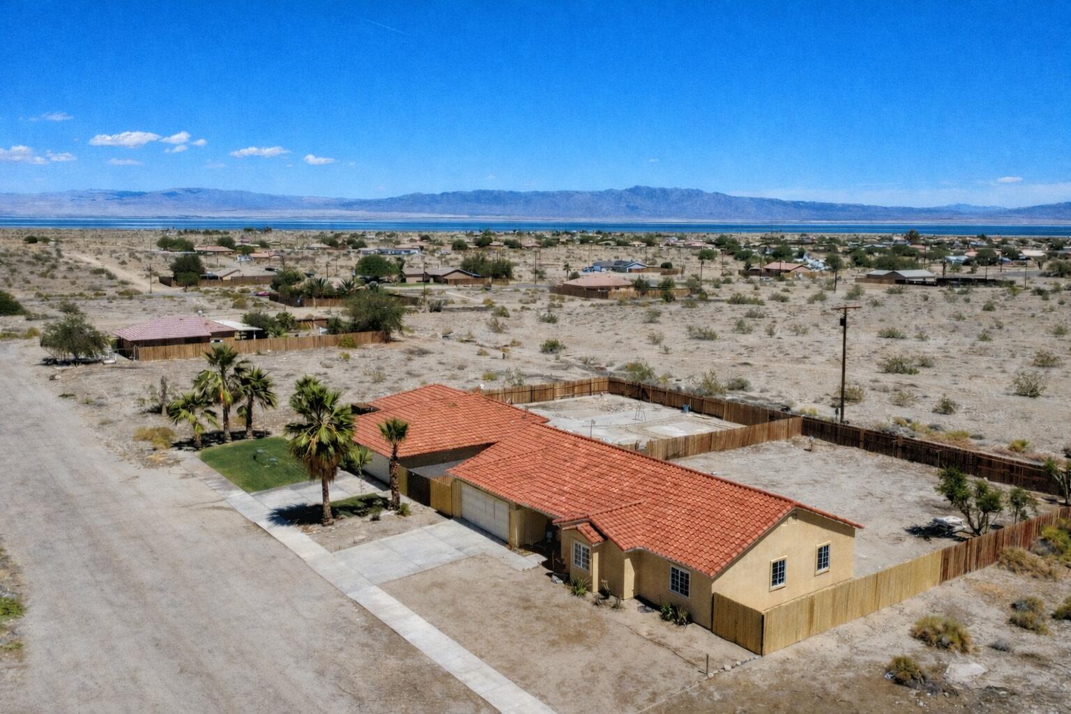 2778 Calhoun Street Thermal, CA 92274 - Photo 5 of 23 an aerial view of a house with a lake view