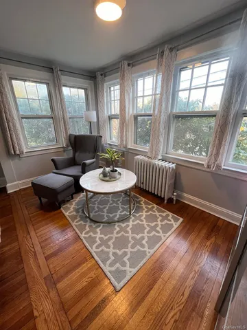 a living room with furniture and a table