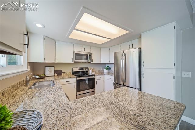 263 Southpark Road Highlands Ranch, CO 80126 - Photo 12 of 42 Updated cabinets and hardware