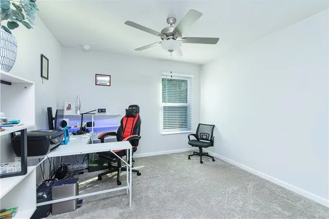a workspace with furniture and wooden floor