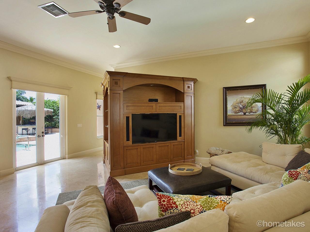 116 Santander Drive Jupiter, FL 33458 - Photo 5 of 40 Family Room view to Pool