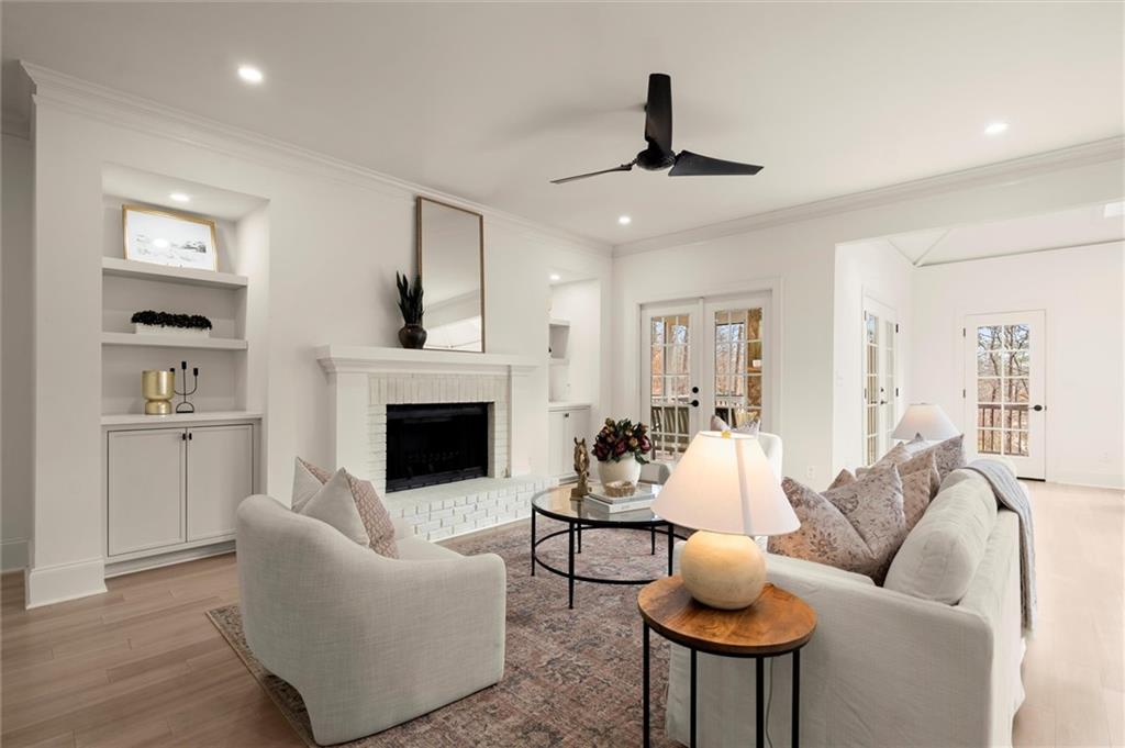 539 Schofield Drive Powder Springs, GA 30127 - Photo 14 of 45 a living room with furniture and a fireplace