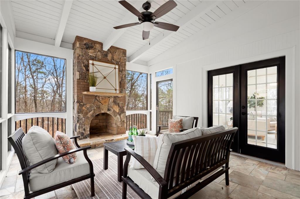 539 Schofield Drive Powder Springs, GA 30127 - Photo 44 of 45 a living room with furniture and a floor to ceiling window