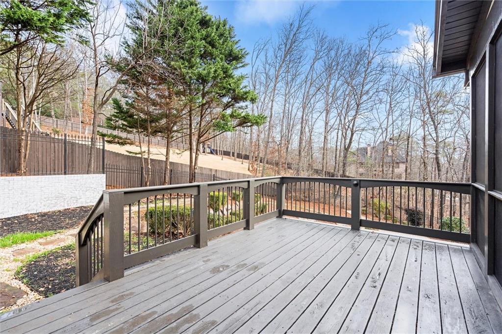 539 Schofield Drive Powder Springs, GA 30127 - Photo 45 of 45 a view of outdoor space with deck and trees