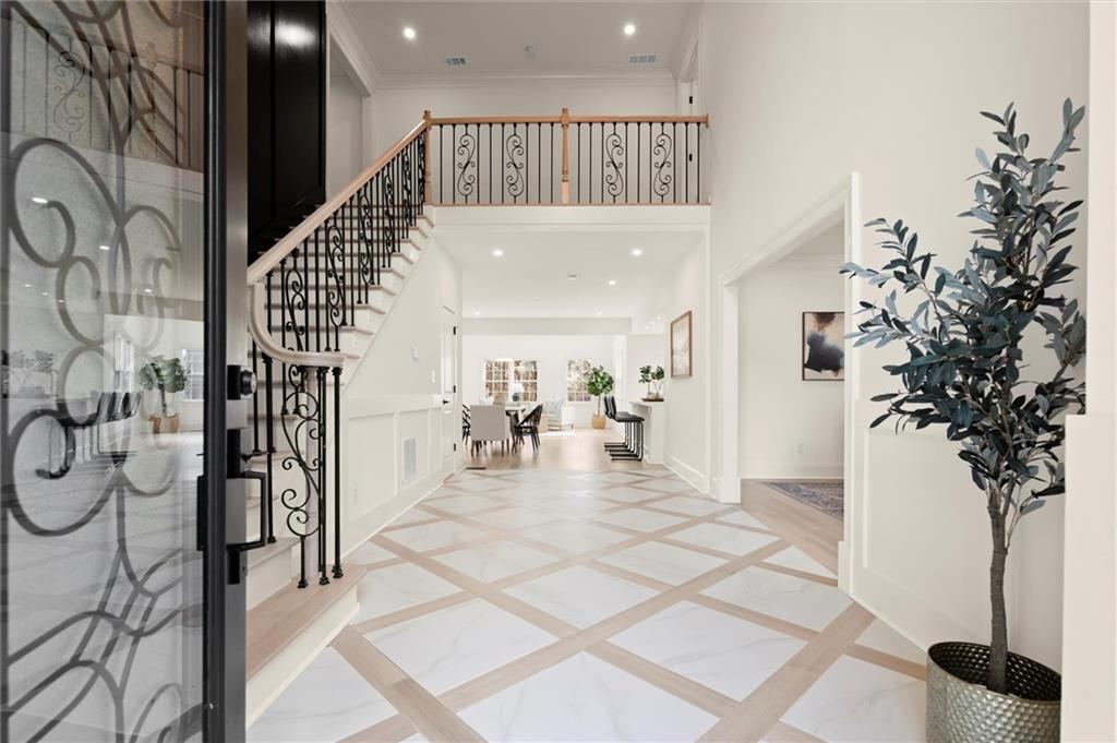 539 Schofield Drive Powder Springs, GA 30127 - Photo 5 of 45 a view of entryway and hall with wooden floor