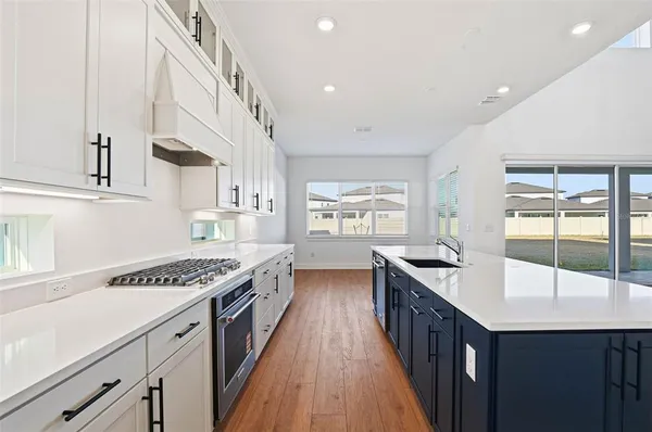 a view of an empty room with glass door