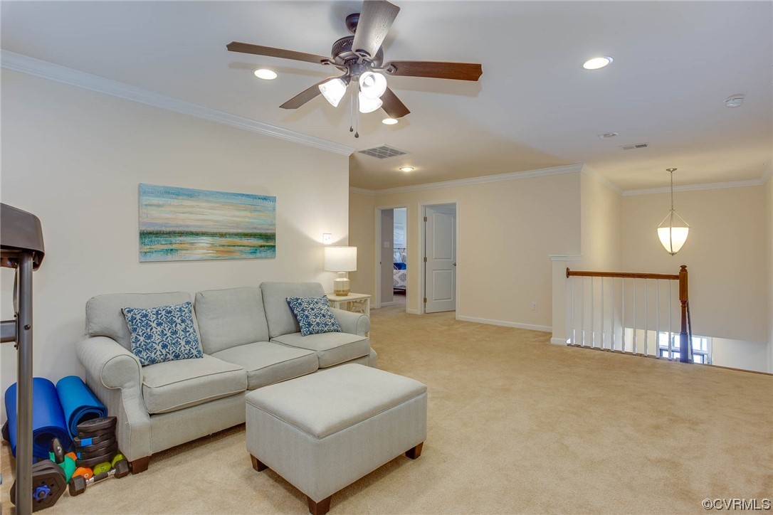 5841 Riverside Trail Richmond, VA 23225 - Photo 19 of 28 a living room with furniture and a chandelier