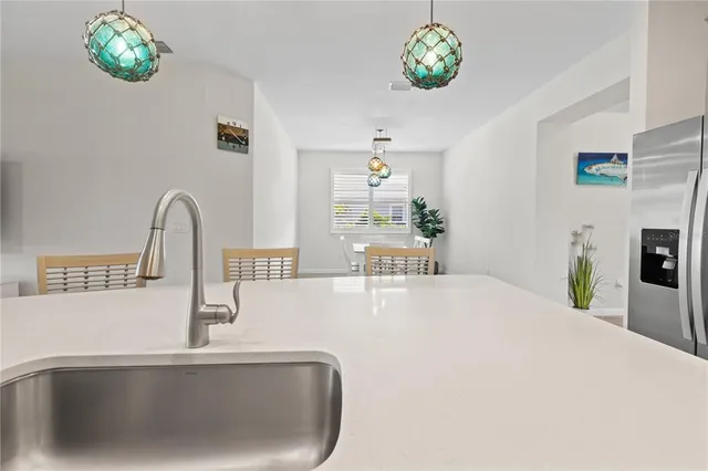 a bathroom with a sink a vanity and a bathtub