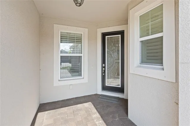 an empty room with windows