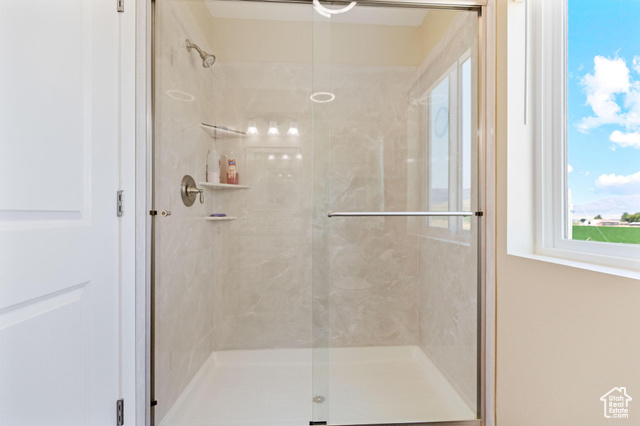 19502 South Olson Road Downey, ID 83234 - Photo 53 of 64 ADU: Bathroom with a marble finish shower
