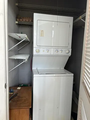 a utility room with washer and dryer