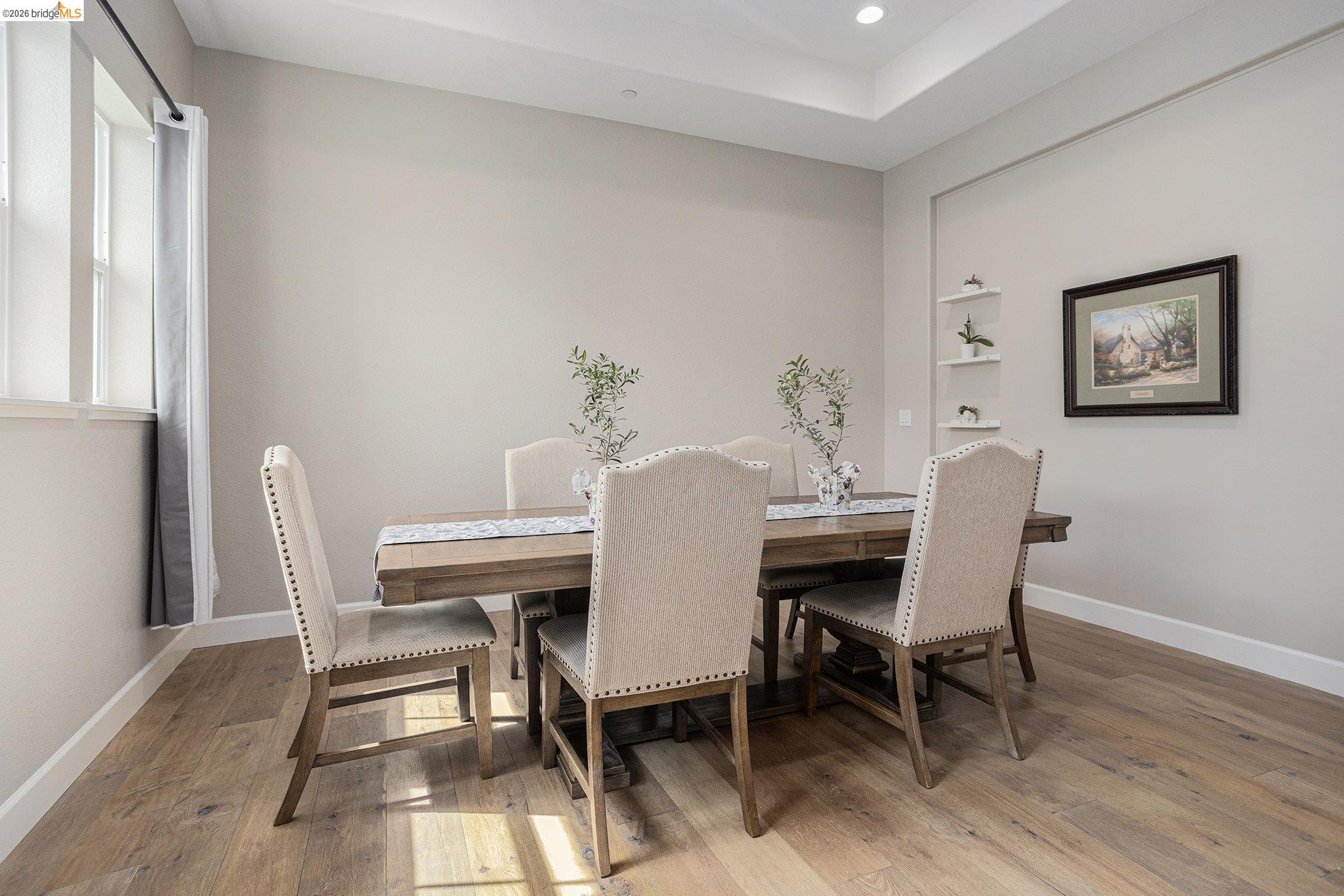 5010 Neroly Road Oakley, CA 94561 - Photo 17 of 40 a view of a dining room with furniture and wooden floor
