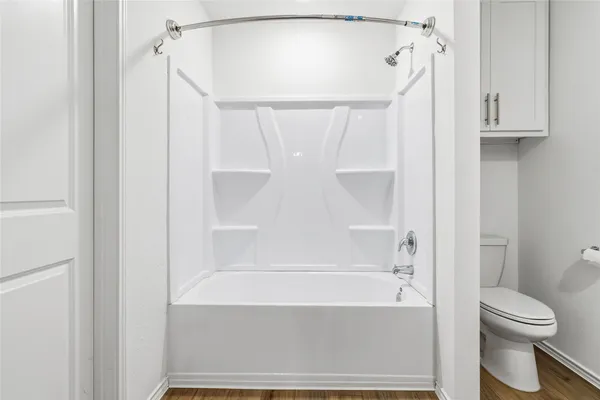 an empty room with fan