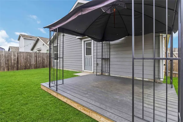 a view of a backyard of a house