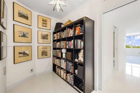 a view of a livingroom with shelves