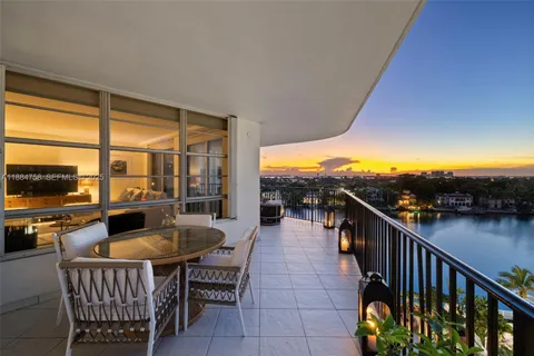 a view of a couches in the balcony