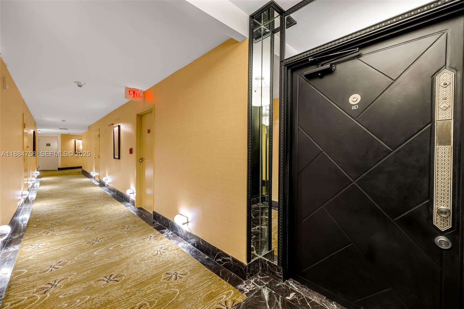 5660 Collins Avenue, Unit 8D Miami Beach, FL 33140 - Photo 35 of 41 a view of a hallway