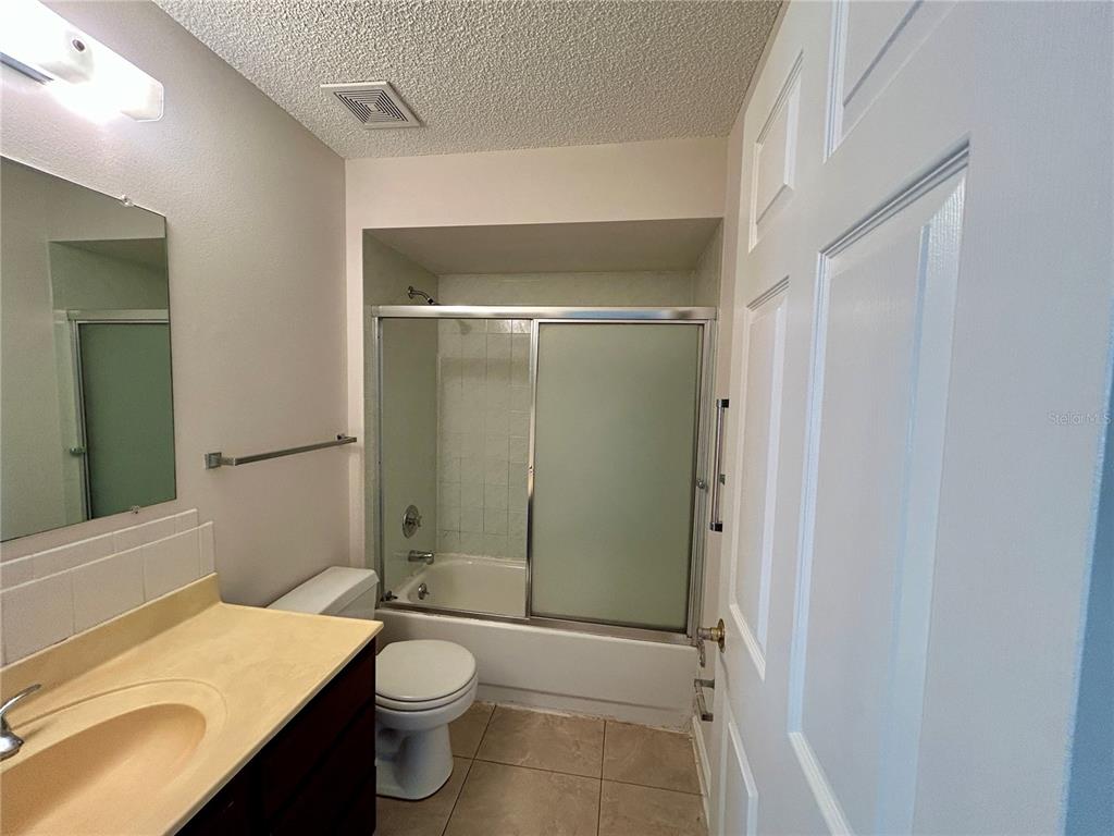 1907 Northwest 50th Circle Ocala, FL 34482 - Photo 11 of 25 a bathroom with a sink a toilet and shower