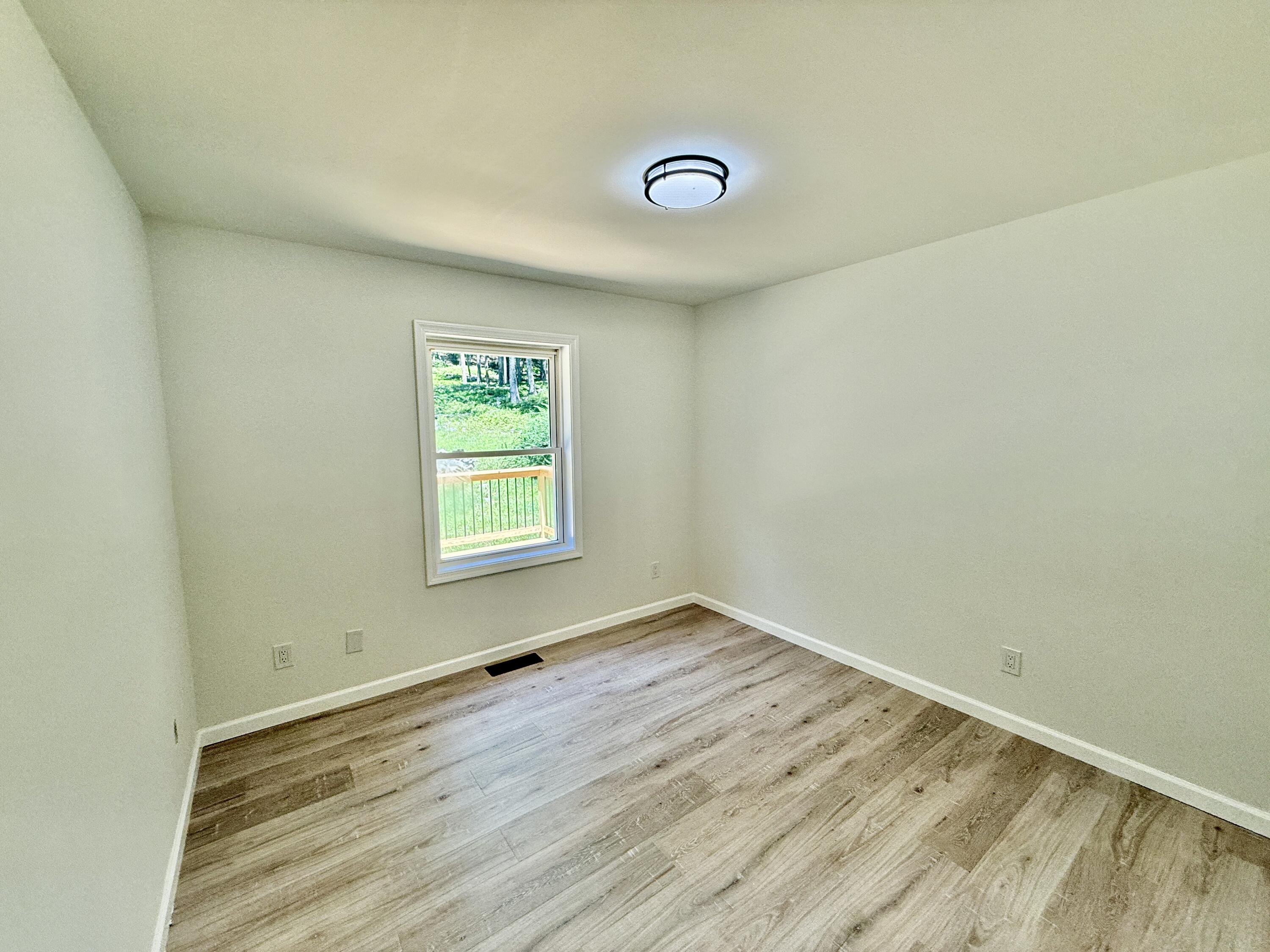 459 Pocono Boulevard Bushkill, PA 18324 - Photo 18 of 62 a view of a livingroom with wooden floor