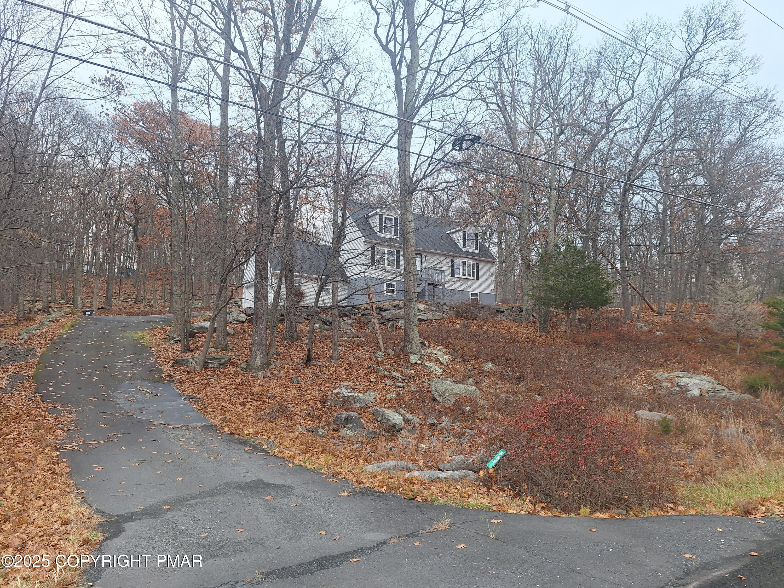 459 Pocono Boulevard Bushkill, PA 18324 - Photo 2 of 62 a view of a yard with trees