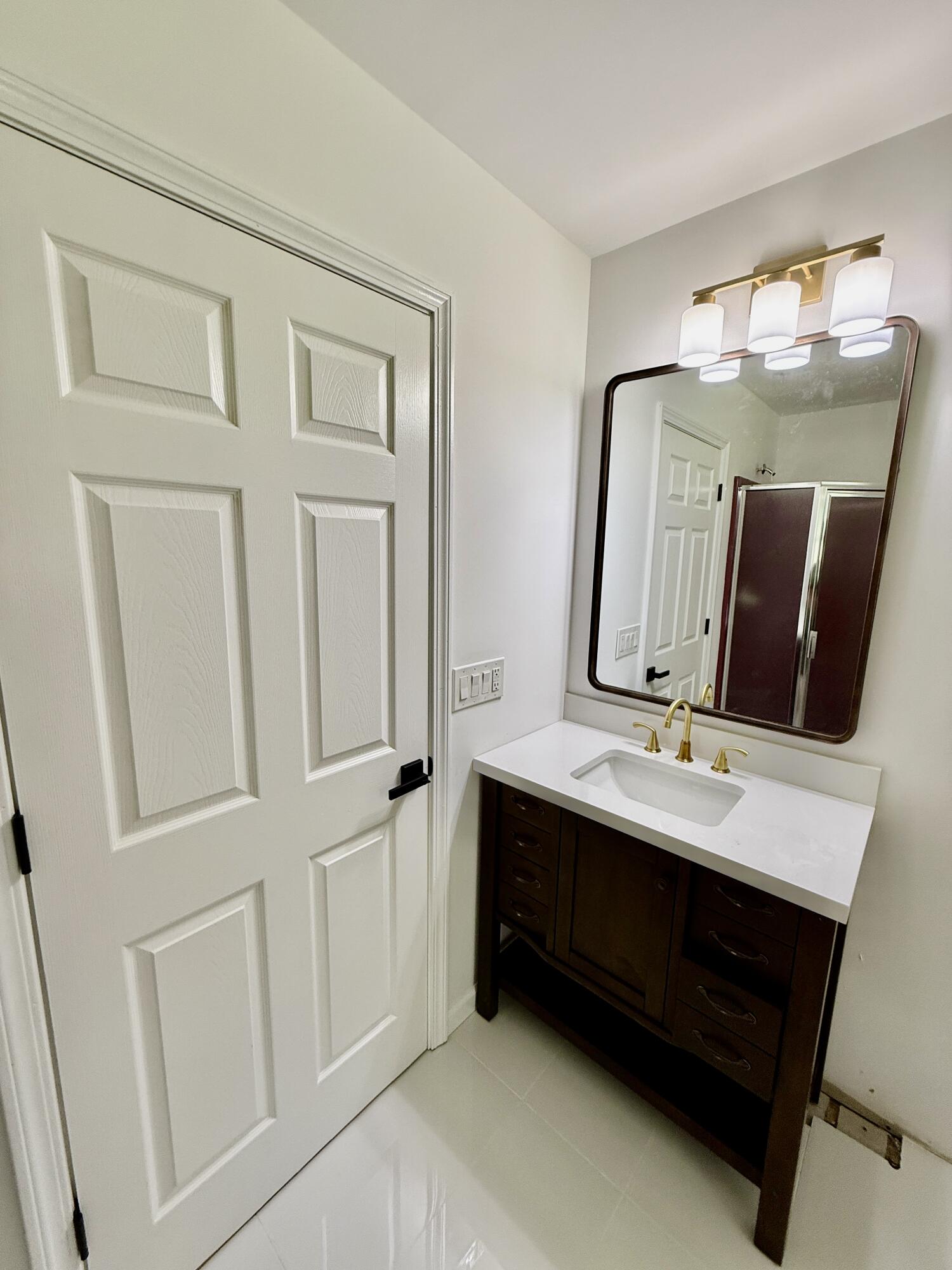 459 Pocono Boulevard Bushkill, PA 18324 - Photo 35 of 62 a bathroom with a double vanity sink and mirror