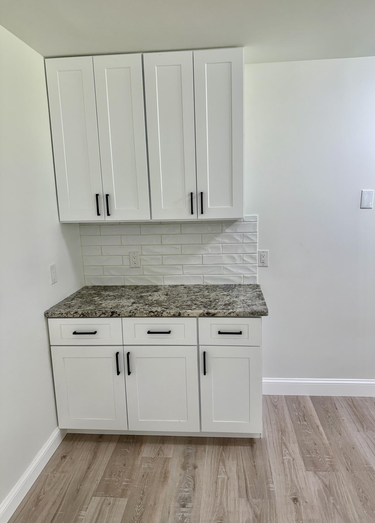 459 Pocono Boulevard Bushkill, PA 18324 - Photo 4 of 62 a view of kitchen with granite countertop cabinets and wooden floor