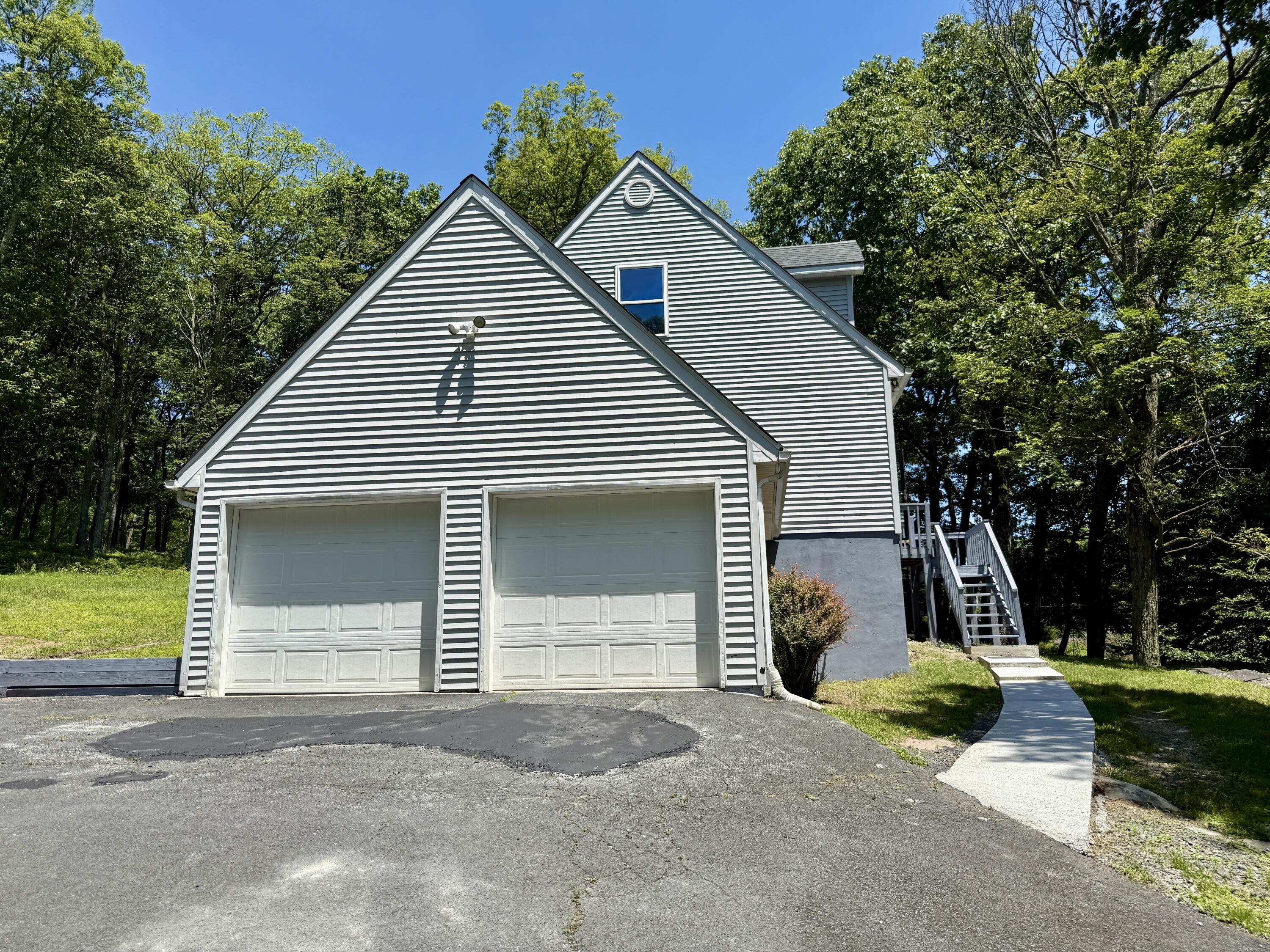 459 Pocono Boulevard Bushkill, PA 18324 - Photo 46 of 62 a view of a house with a yard and large trees