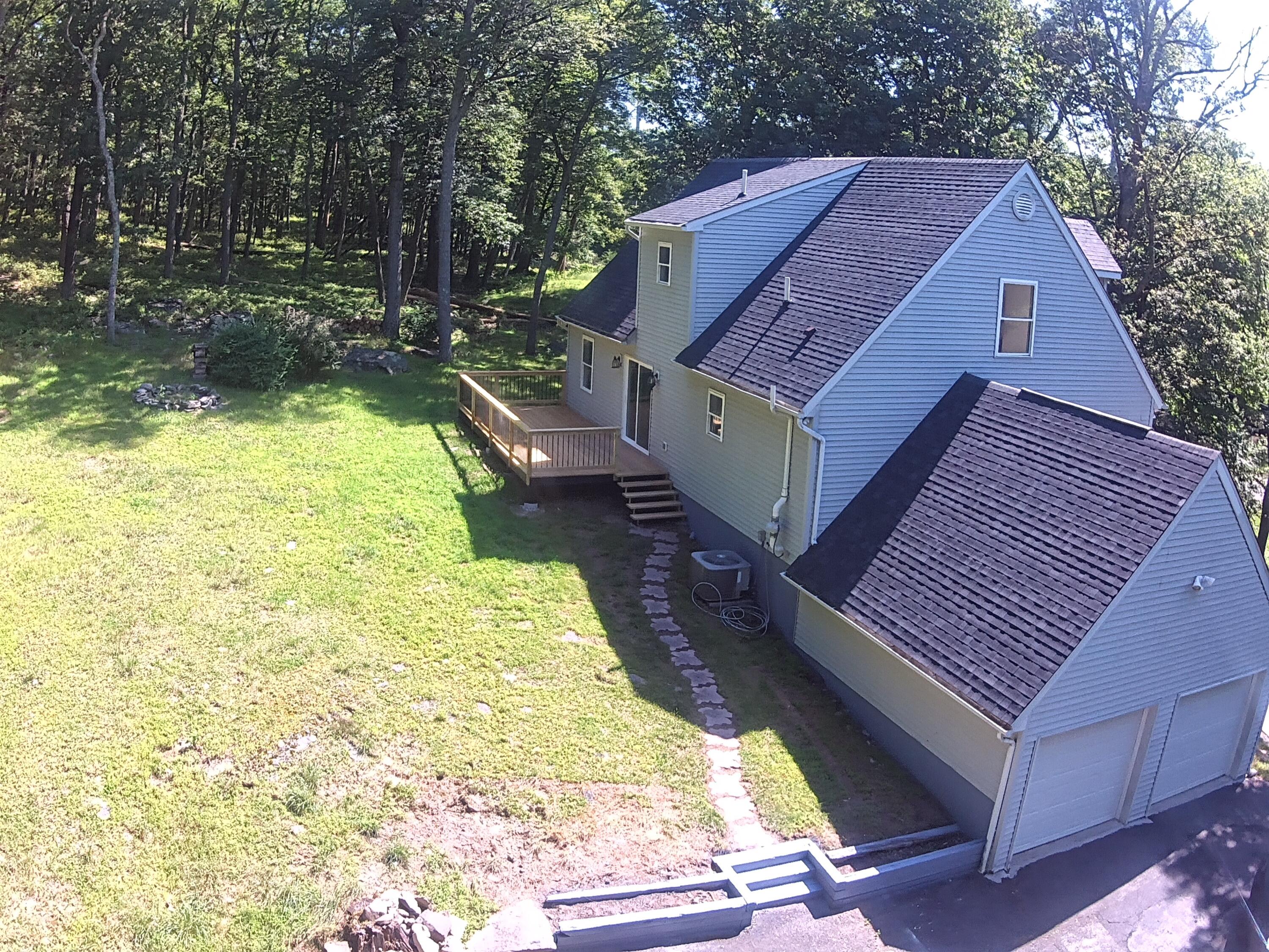 459 Pocono Boulevard Bushkill, PA 18324 - Photo 52 of 62 a aerial view of a house with a yard