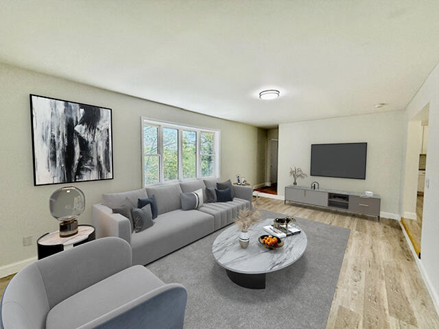 459 Pocono Boulevard Bushkill, PA 18324 - Photo 9 of 62 a living room with furniture and a flat screen tv