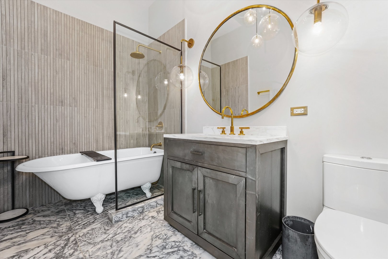 321 South Sangamon Street, Unit 902 Chicago, IL 60607 - Photo 15 of 18 a bathroom with a toilet a sink and a mirror