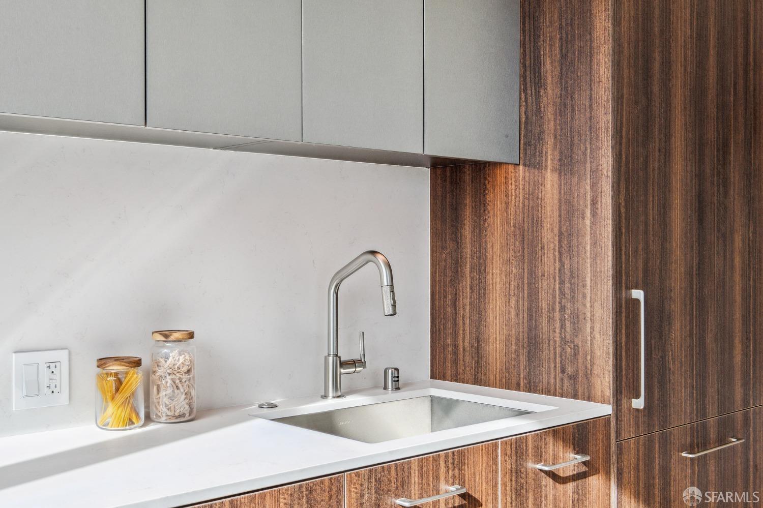 280 Spear Street, Unit 34C San Francisco, CA 94105 - Photo 14 of 47 a bathroom with a sink and a mirror