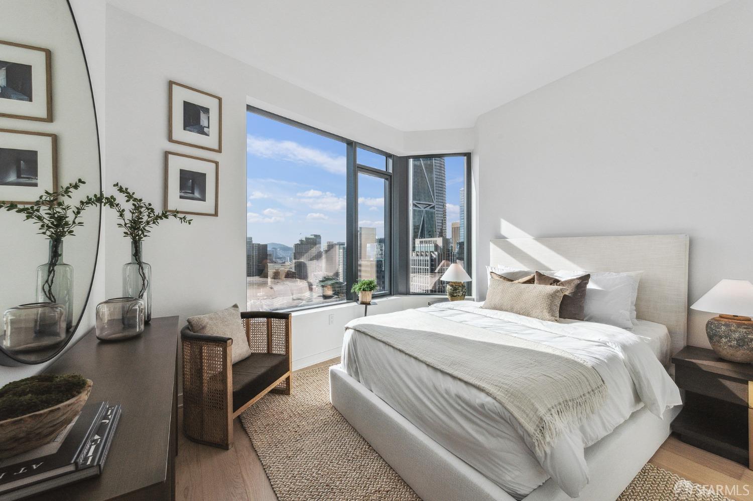 280 Spear Street, Unit 34C San Francisco, CA 94105 - Photo 17 of 47 a bedroom with a bed and a large window