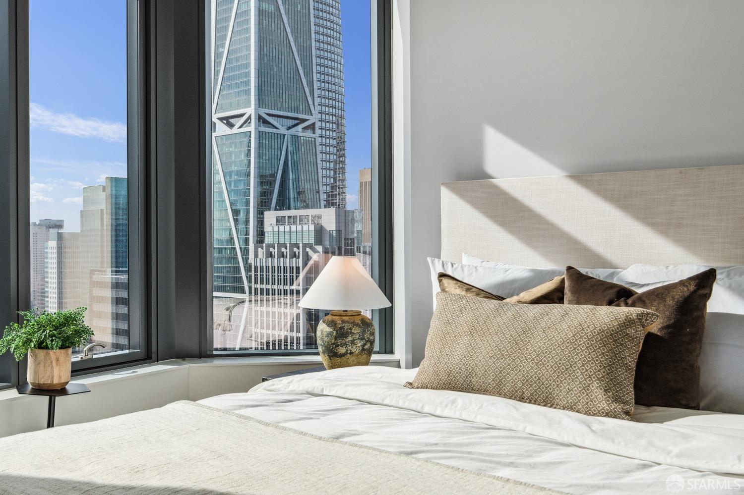 280 Spear Street, Unit 34C San Francisco, CA 94105 - Photo 19 of 47 a bedroom with a bed and window